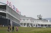 Fans walk on the first hole during a practice round for the U.S. Open Championship golf tournament at The Los Angeles Country Club on Wednesday, June 14, 2023, in Los Angeles. (AP Photo/George Walker IV)