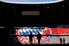 FILE - Workers prepare the FC Bayern Munich soccer stadium Allianz Arena in Munich, Germany, Wednesday, Nov. 9, 2022. German soccer giant Bayern Munich has been reprimanded and fined by the Munich customs office for not paying its workers the minimum wage. (AP Photo/Matthias Schrader, File)