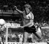 FILE - Scottish defender Gordon McQueen. in action, Sept. 12, 1983. Former Manchester United defender Gordon McQueen has died, it was reported on Thursday, June 15, 2023. He was 70. McQueen’s death was announced via a statement from his family released by Man United. McQueen was diagnosed with vascular dementia in 2021. He began his career at Scottish club St. Mirren and went on to play for English teams Leeds and Manchester United. (PA via AP, File)