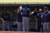 Tampa Bay Rays' Luke Raley (55) celebrates with teammates at the dugout after scoring against the Oakland Athletics on Taylor Walls' double during the second inning of a baseball game in Oakland, Calif., Thursday, June 15, 2023. (AP Photo/Godofredo A. Vásquez)