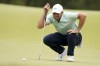Scottie Scheffler lines up a putt on the 16th hole during the first round of the U.S. Open golf tournament at Los Angeles Country Club on Thursday, June 15, 2023, in Los Angeles. (AP Photo/Marcio J. Sanchez)