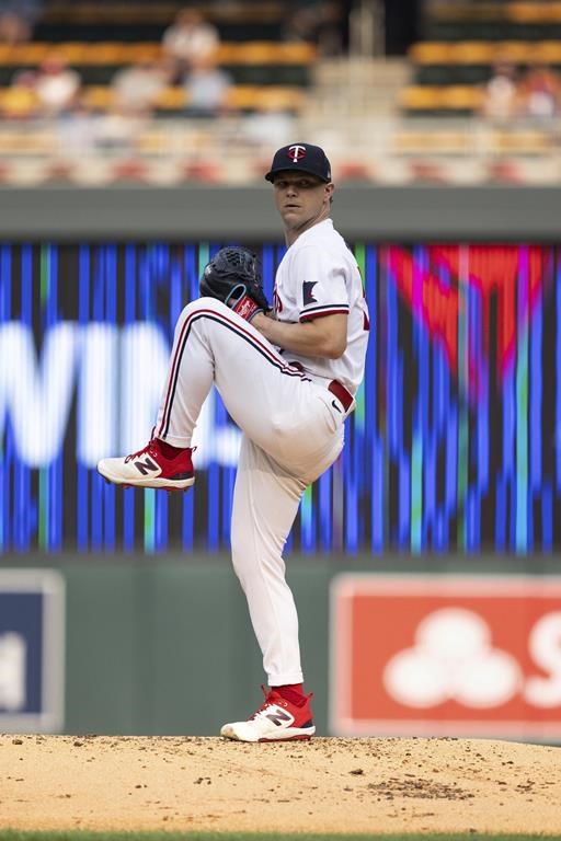 Minnesota Twins starting pitcher Sonny Gray winds up during the second inning of the team's baseball game against the Detroit Tigers on Thursday, June 15, 2023, in Minneapolis. (AP Photo/Bailey Hillesheim)