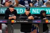 New York Yankees Aaron Judge, center, watches with teammates during the ninth inning of a baseball game against the New York Mets Tuesday, June 13, 2023, in New York. The Yankees won 7-6. (AP Photo/Frank Franklin II)