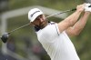 Dustin Johnson watches his tee shot on the fifth hole during the second round of the U.S. Open golf tournament at Los Angeles Country Club on Friday, June 16, 2023, in Los Angeles. (AP Photo/Marcio J. Sanchez)