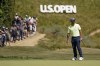 Xander Schauffele watches his putt on the fourth hole during the second round of the U.S. Open golf tournament at Los Angeles Country Club on Friday, June 16, 2023, in Los Angeles. (AP Photo/Marcio J. Sanchez)