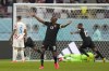 Canada's Atiba Hutchinson celebrates after Canada's Alphonso Davies scored his side's opening goal during the World Cup group F soccer match between Croatia and Canada, at the Khalifa International Stadium in Doha, Qatar, Sunday, Nov. 27, 2022. THE CANADIAN PRESS/AP-Aijaz Rahi