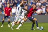 Scotland's Ryan Christie in a duel with Norwegian Fredrik Aursnes during the Euro 2024 group A qualifying soccer match between Norway and Scotland at Ullevaal Stadium in Olso, Norway, Saturday, June 17, 2023. (Fredrik Varfjell/NTB Scanpix via AP)