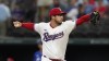 Texas Rangers starting pitcher Dane Dunning throws during the first inning of a baseball game against the Toronto Blue Jays in Arlington, Texas, Saturday, June 17, 2023. (AP Photo/LM Otero)