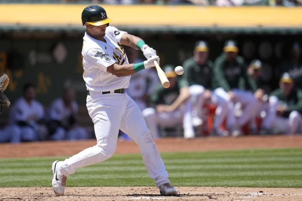 Oakland Athletics' Carlos Perez hits a home run during the fifth inning of a baseball game against the Philadelphia Phillies in Oakland, Calif., Saturday, June 17, 2023. (AP Photo/Jeff Chiu)