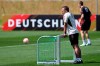 National soccer coach Hansi Flick, front, attends a team's training session of the German national soccer team in Frankfurt, Germany, Wednesday, June 14, 2023. Germany will face Poland for an international friendly soccer match at the national stadium in Warsaw on Friday, June 16, 2023. (Federico Gambarini/dpa via AP)