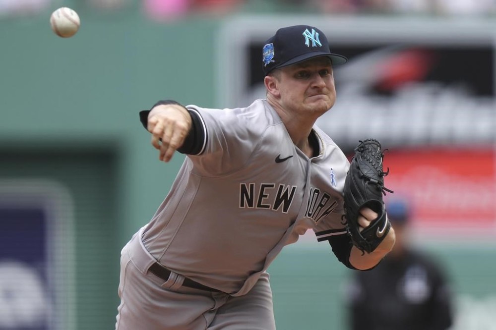 New York Yankees' Clarke Schmidt delivers a pitch against a Boston Red Sox batter in the first inning of a baseball game, Sunday, June 18, 2023, in Boston. (AP Photo/Steven Senne)