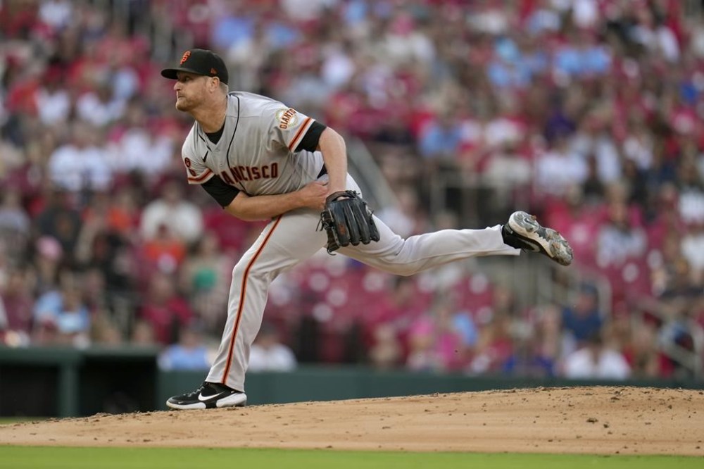 San Francisco Giants starting pitcher Alex Cobb throws during the first inning of a baseball game against the St. Louis Cardinals Tuesday, June 13, 2023, in St. Louis. (AP Photo/Jeff Roberson)