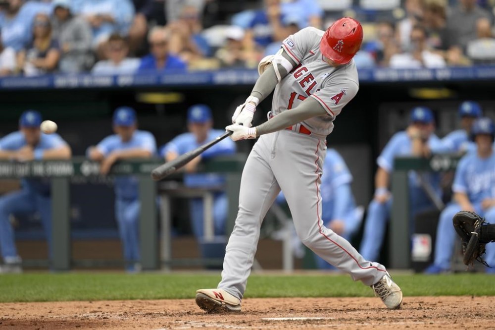 Los Angeles Angels' Shohei Ohtani hits a home run during the fifth inning of a baseball game against the Kansas City Royals, Sunday, June, 18, 2023, in Kansas City, Mo. (AP Photo/Reed Hoffmann)