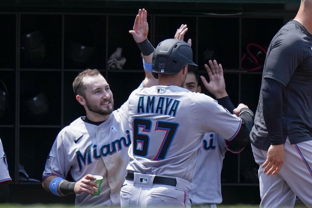 Miami Marlins' Jacob Amaya celebrates scoring during the fourth inning of a baseball game against the Washington Nationals at Nationals Park, Sunday, June 18, 2023, in Washington. (AP Photo/Alex Brandon)