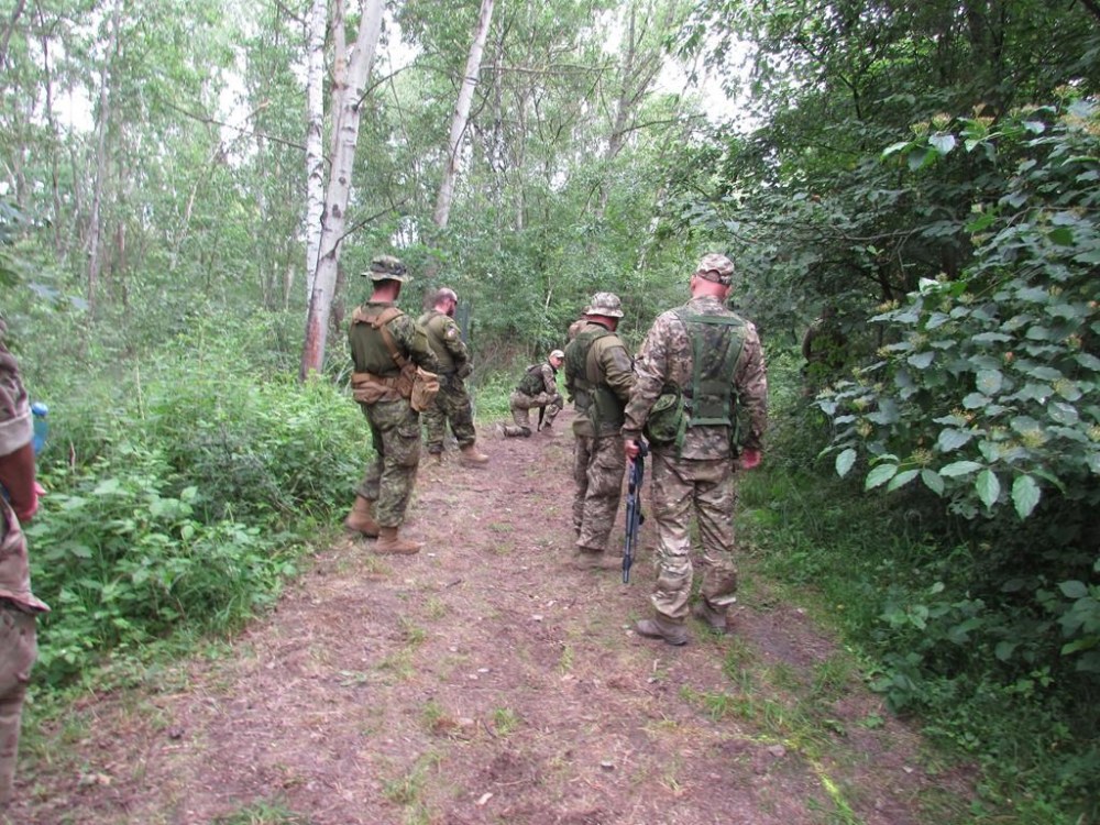 Ukrainian soldiers practice searching for IEDs under the watchful eye of Canadian trainers in southwestern Poland on Monday, June 19, 2023. THE CANADIAN PRESS/Bill Graveland