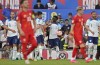 England's Bukayo Saka, centre, celebrates after scoring his side's fifth goal during the Euro 2024 group C qualifying soccer match between England and North Macedonia at Old Trafford in Manchester, Monday June 19, 2023. (AP Photo/Dave Thompson)
