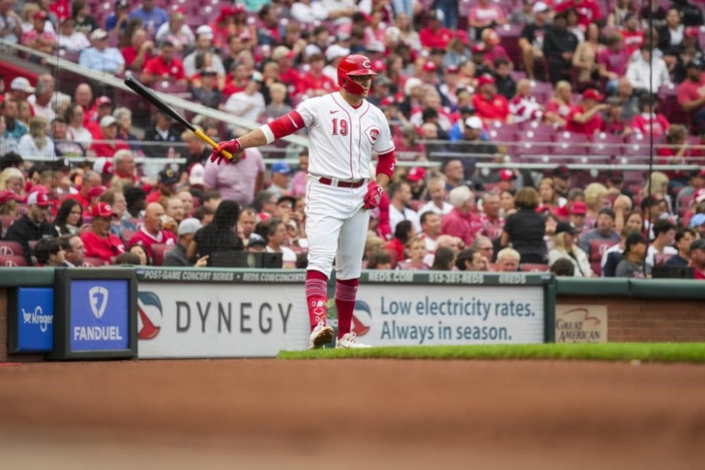 Cincinnati Reds' Joey Votto waits on-deck to bat during the second inning of a baseball game against the Colorado Rockies in Cincinnati, Monday, June 19, 2023. (AP Photo/Aaron Doster)