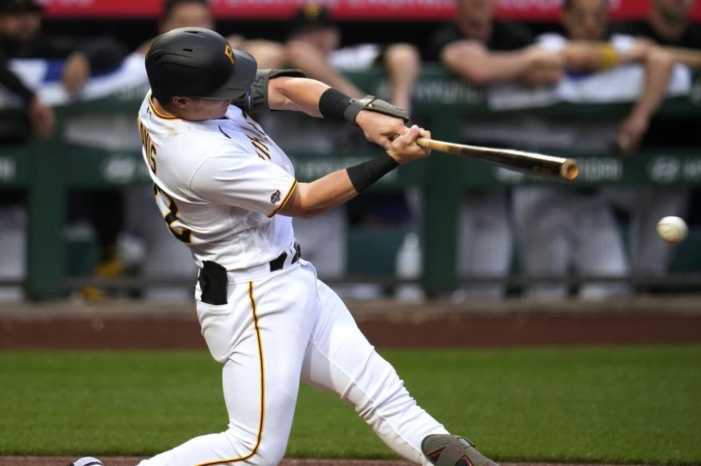 Pittsburgh Pirates' Henry Davis doubles off Chicago Cubs starting pitcher Drew Smyly for his first major league hit in his first major league at-bat during the third inning of a baseball game in Pittsburgh, Monday, June 19, 2023. (AP Photo/Gene J. Puskar)