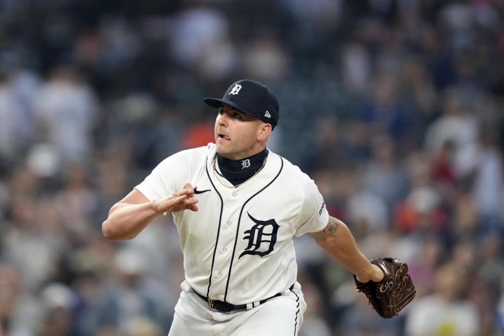 Detroit Tigers relief pitcher Alex Lange follows the ball hit by Kansas City Royals' Samad Taylor to first baseman Spencer Torkelson to end the ninth inning of a baseball game, Monday, June 19, 2023, in Detroit. (AP Photo/Carlos Osorio)