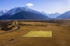This photo released by Tourism New Zealand, shows a soccer pitch at Aoraki Mount Cook in the South Island of New Zealand, Saturday, June 3, 2023. New Zealand has marked one month countdown to the start of the Women's World Cup by creating a full-sized football pitch in the remote southern highlands of the South Island, in the shadow of New Zealand's highest mountain Aoraki Mount Cook. (Brett Phibbs/Tourism New Zealand via AP)