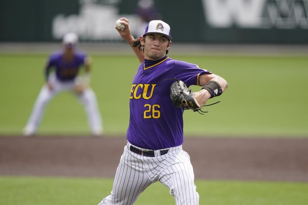 FILE - East Carolina pitcher Gavin Williams throws against Vanderbilt during the first inning of an NCAA college baseball super regional game Friday, June 11, 2021, in Nashville, Tenn. Gavin Williams, Cleveland's top pitching prospect, will make his major league debut on Wednesday, June 21, 2023, with a start against the Oakland Athletics. (AP Photo/Mark Humphrey, File)