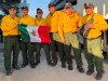Wildland firefighters from Mexico pose for a group portrait in an undated handout photo. More than 100 Mexican firefighters have arrived in Ontario, the first round of International support to help battle the raging wildfires in the province this season. THE CANADIAN PRESS/HO-Ontario Ministry of Natural Resources and Forestry, Aviation, Forest Fire and Emergency Services, *MANDATORY CREDIT*