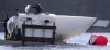 OceanGate CEO Stockton Rush emerges from the hatch atop the OceanGate submarine Cyclops 1 in the San Juan Islands, Wash., on Sept. 12, 2018. Rescuers in a remote area of the Atlantic Ocean raced against time Tuesday to find a missing submersible before the oxygen supply runs out for five people, including Stockton, who were on a mission to document the wreckage of the Titanic. (Alan Berner/The Seattle Times via AP)