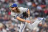 Kansas City Royals relief pitcher Scott Barlow throws during the ninth inning of a baseball game against the Detroit Tigers, Tuesday, June 20, 2023, in Detroit. (AP Photo/Carlos Osorio)