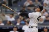 New York Yankees' Anthony Rizzo hits an RBI double off Seattle Mariners starting pitcher George Kirby in the first inning of a baseball game, Tuesday, June 20, 2023, in New York. (AP Photo/John Minchillo)