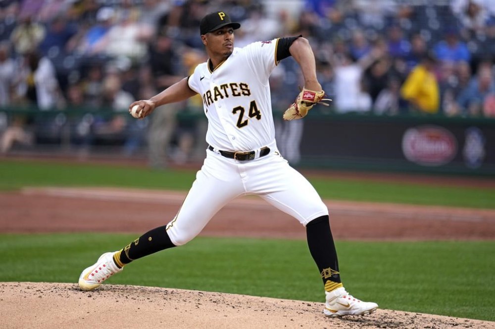 Pittsburgh Pirates starting pitcher Johan Oviedo winds up during the first inning of the team's baseball game against the Chicago Cubs in Pittsburgh, Tuesday, June 20, 2023. (AP Photo/Gene J. Puskar)