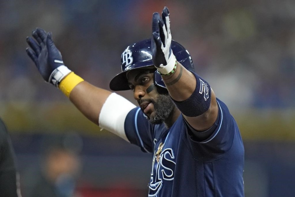 Tampa Bay Rays' Yandy Diaz celebrates after his RBI single off Baltimore Orioles relief pitcher Mike Baumann scored Isaac Paredes during the sixth inning of a baseball game Tuesday, June 20, 2023, in St. Petersburg, Fla. (AP Photo/Chris O'Meara)