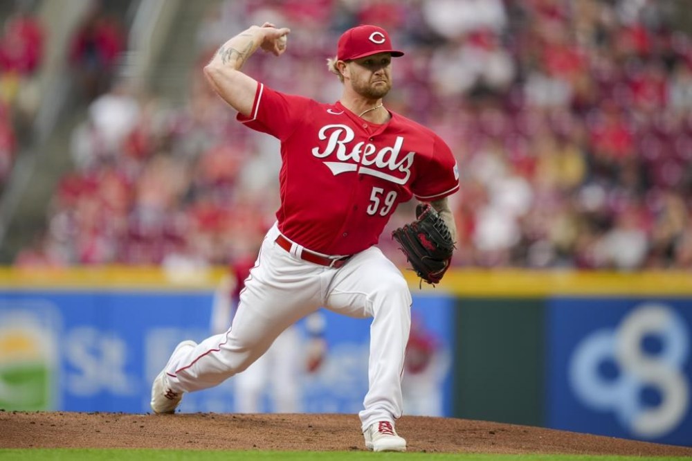 Cincinnati Reds' Ben Lively throws during the first inning of the team's baseball game against the Colorado Rockies in Cincinnati, Tuesday, June 20, 2023. (AP Photo/Aaron Doster)