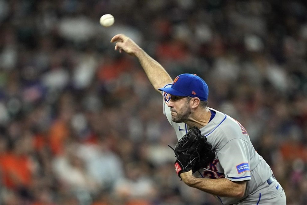 New York Mets starting pitcher Justin Verlander throws during the second inning of a baseball game against the Houston Astros Tuesday, June 20, 2023, in Houston. (AP Photo/David J. Phillip)
