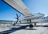 A WestJet Encore Bombardier Q400 twin-engined turboprop aircraft is prepared for a flight in Kamloops, B.C., Saturday, June 3, 2023. WestJet CEO Alexis von Hoensbroech says the integration of discount carriers Swoop and Sunwing Airlines into its mainline operation will tamp down costs and avoid higher fares for customers. THE CANADIAN PRESS/Jeff McIntosh