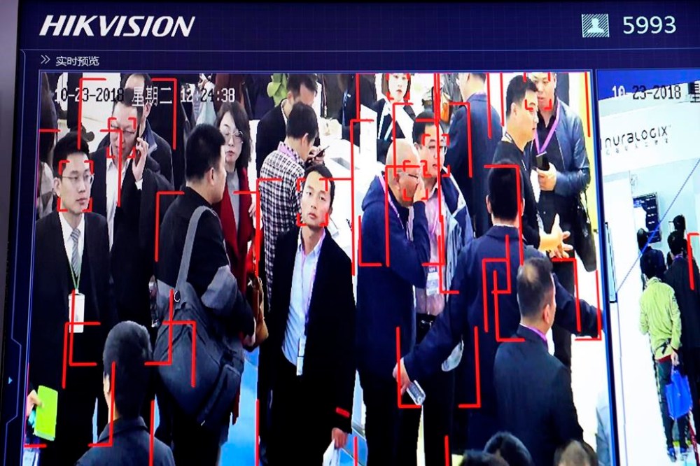 Visitors at the Security China 2018 expo are tracked by facial recognition technology from state-owned surveillance equipment manufacturer Hikvision in Beijing, Tuesday, Oct. 23, 2018. A group of technology and human rights organizations are calling on the Canadian federal government to take immediate action to address artificial intelligence and facial recognition technology. THE CANADIAN PRESS/AP-Ng Han Guan