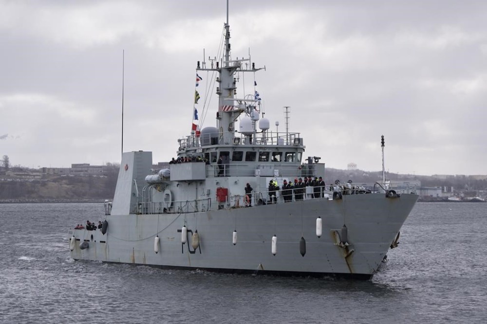 HMCS Glace Bay in Halifax Harbour during the ship's homecoming in Halifax on Friday, March 31, 2023. As the search for a missing submersible with five people aboard continues about 700 kilometres south of Newfoundland, two federal cabinet ministers came forward today to say the focus in on saving lives, not on the cost of the rescue operation. THE CANADIAN PRESS/Darren Calabrese