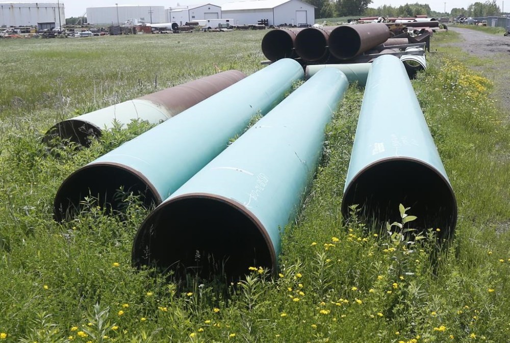 Pipeline used to carry crude oil sits at the Superior, Wis., terminal of Enbridge Energy, June 29, 2018. The Indigenous band that’s fighting Line 5 says three years is too long to wait for the controversial cross-border pipeline to be moved. THE CANADIAN PRESS/AP/Jim Mone