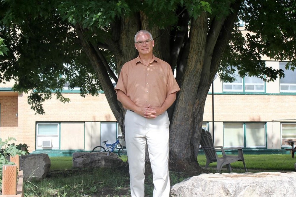 Wayne Olson, a community minister for the Church of Christ in Dauphin, stands outside Parkland Crossing in Dauphin, Man., on Wednesday, June 21, 2023. Olson is one of the organizers of a community memorial service for the 16 people who were killed in a bus crash a week ago. THE CANADIAN PRESS/Kelly Geraldine Malone