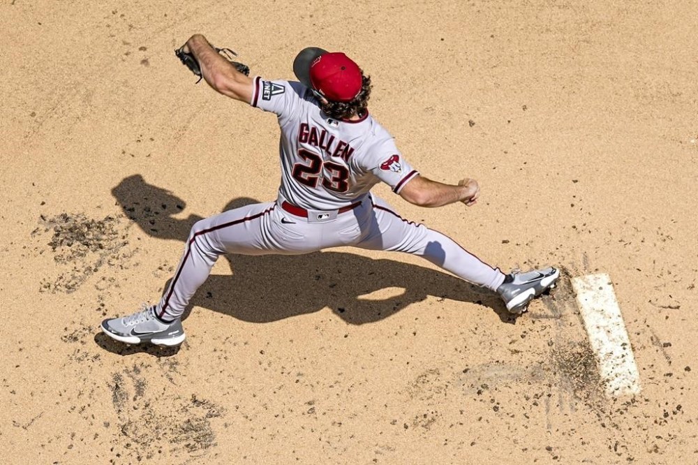 Arizona Diamondbacks starting pitcher Zac Gallen throws during the first inning of a baseball game against the Milwaukee Brewers Wednesday, June 21, 2023, in Milwaukee. (AP Photo/Morry Gash)