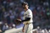 Minnesota Twins relief pitcher Jorge Lopez reacts after a two-run home run by Toronto Blue Jays' Daulton Varsho during the ninth inning of a baseball game Saturday, May 27, 2023, in Minneapolis. (AP Photo/Abbie Parr)