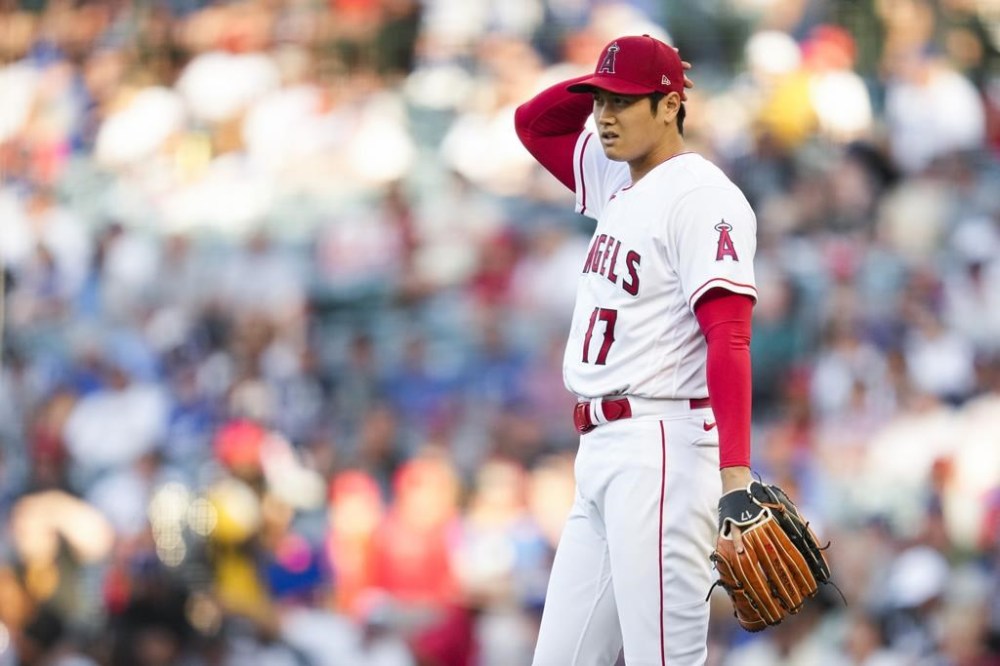 Los Angeles Angels starting pitcher Shohei Ohtani (17) reacts after a pitch during the first inning of a baseball game against the Los Angeles Dodgers in Anaheim, Calif., Wednesday, June 21, 2023. (AP Photo/Ashley Landis)