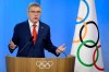 International Olympic Committee (IOC) President Thomas Bach speaks at the opening of the extraordinary hybrid 140th IOC Session of the International Olympic Committee (IOC), at the Olympic House, in Lausanne, Switzerland, Thursday, June 22, 2023. (Laurent Gillieron/Keystone via AP)