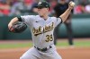Oakland Athletics starting pitcher JP Sears delivers during the first inning of a baseball game against the Cleveland Guardians, Thursday, June 22, 2023, in Cleveland. (AP Photo/David Dermer)