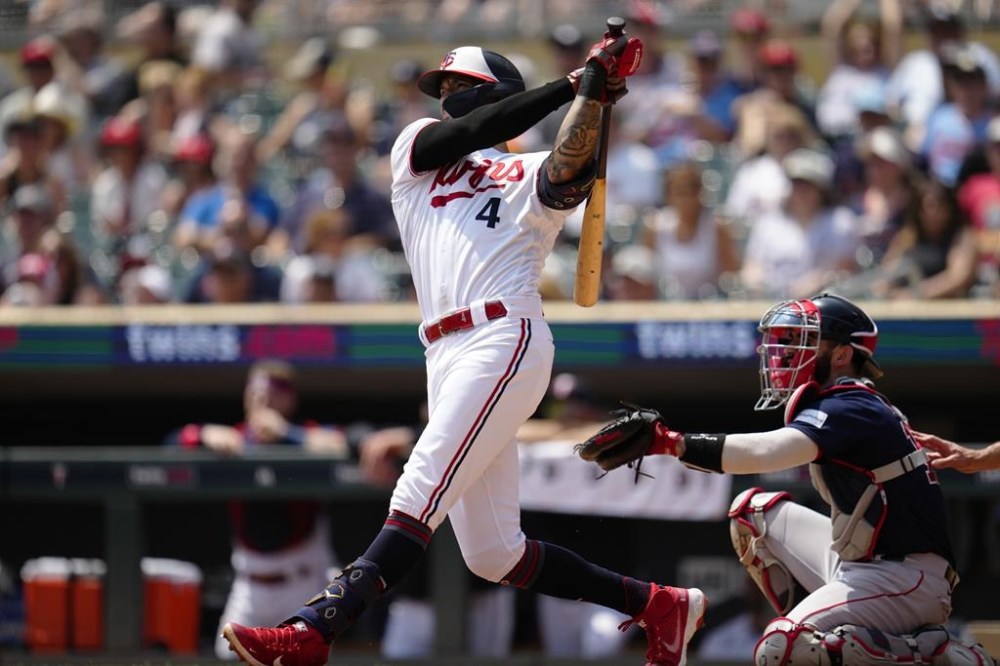 Minnesota Twins' Carlos Correa hits a solo home run during the first inning of a baseball game against the Boston Red Sox, Thursday, June 22, 2023, in Minneapolis. (AP Photo/Abbie Parr)