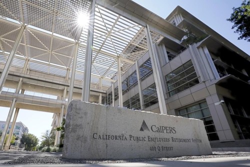 FILE - The suns peaks over the California Public Employees Retirement System's building in Sacramento, Calif., on Sept. 6, 2022. California officials say the personal information of about 769,000 people has been exposed in a third-party data breach linked to the state's retirement system. (AP Photo/Rich Pedroncelli, File)
