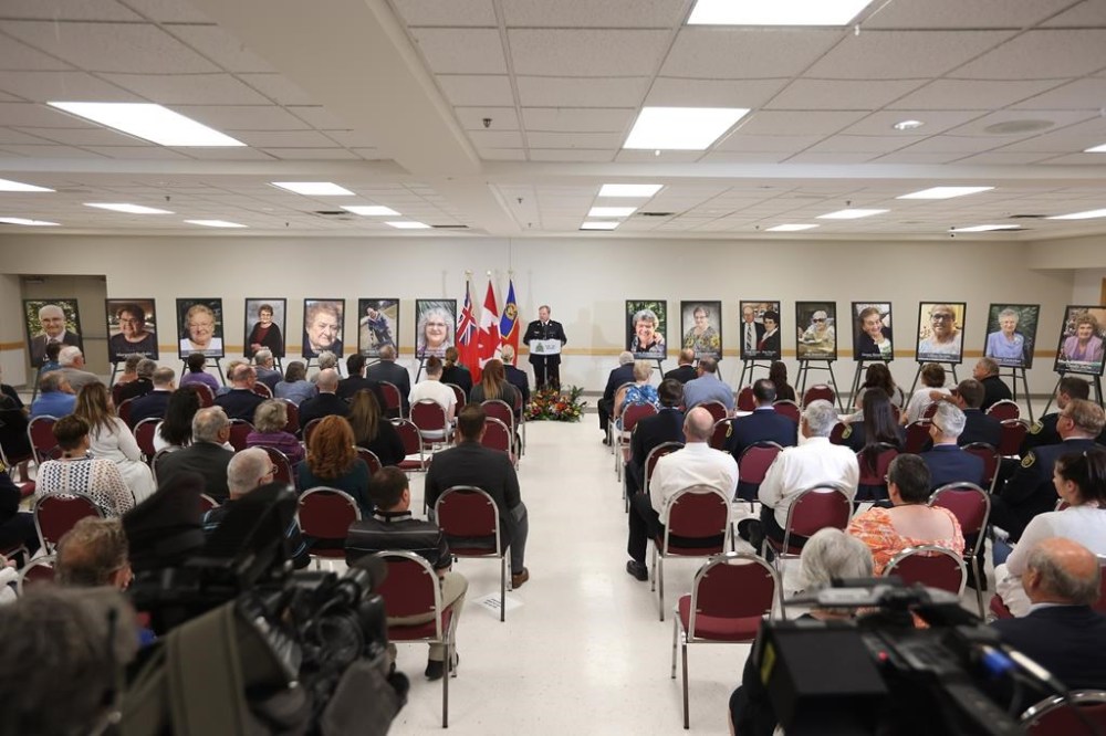 Supt. Jeff Asmundson, West District Commander with Manitoba RCMP speaks during a press conference in Dauphin, Man., on Thursday, June 22, 2023. Family members of 16 seniors who died in a highway crash honoured their loved ones Thursday, silently placing large photos of them on easels as police publicly confirmed the names of the victims. THE CANADIAN PRESS/The Brandon Sun - Tim Smith **MANDATORY CREDIT**