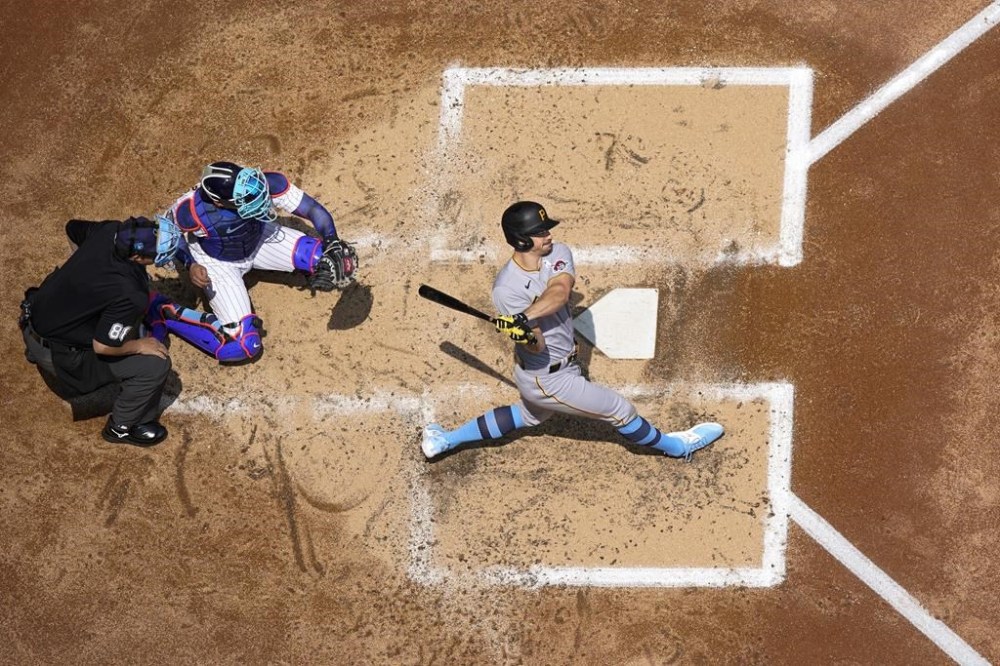 Pittsburgh Pirates' Bryan Reynolds hits a two-run home run during the third inning of a baseball game against the Milwaukee Brewers Sunday, June 18, 2023, in Milwaukee. (AP Photo/Morry Gash)