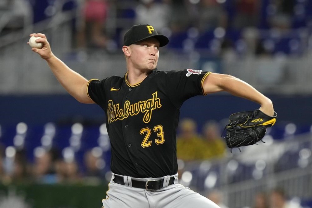 Pittsburgh Pirates' Mitch Keller delivers a pitch during the first inning of a baseball game against the Miami Marlins, Thursday, June 22, 2023, in Miami. (AP Photo/Wilfredo Lee)