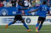 CF Montreal defender Zachary Brault-Guillard (15) celebrates his goal with teammate Mason Toye (13) during first half MLS soccer action against Minnesota United in Montreal, Saturday, June 10, 2023. After tying the Major League Soccer record for most consecutive shutout wins at home with six, CF Montreal is looking to duplicate that success on the road. THE CANADIAN PRESS/Evan Buhler