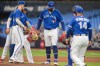 Toronto Blue Jays starting pitcher Alek Manoah (6) steps off the mound before being pulled by manager John Schneider (14) against the Houston Astros in first inning American League MLB baseball action in Toronto on Monday, June 5, 2023. There's no firm date for pitcher Alek Manoah's return to the Blue Jays starting rotation. THE CANADIAN PRESS/Andrew Lahodynskyj